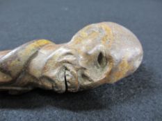 CARVED TIPSTAFF/CLUB in the form of a man's head with shirt collar and tie, 37cms L
