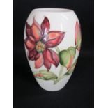MOORCROFT 'CLEMATIS' VASE, cream ground, 21cms H, impressed marks to the base with signature (all