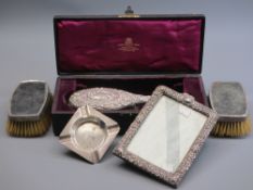 SMALL SILVER, 5 ITEMS - a Chester silver hairbrush, makers John & William Deakin, in a velvet and