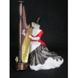 ROYAL DOULTON 'WELSH LADY HARPIST' china figurine, HN4968, no. 1001 from a worldwide limited edition