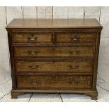 ANTIQUE OAK & CROSSBANDED MAHOGANY CHEST of two short over three long oak lined drawers, having oval