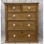 LARGE VICTORIAN STRIPPED PINE CHEST of two short over three long drawers with white porcelain