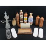 STONEWARE BOTTLES, ceramic door finger plates and a modern cast brass swing doorbell, 34cms H