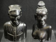 CARVED EBONY BUSTS of a man and woman, 20cms H the tallest