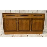 G-PLAN MID CENTURY SIDEBOARD having three frieze drawers and three lower cupboard doors, red label