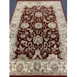 FFRITH LTD ZIEGLER PALACE RUG, red and cream bordered ground with repeating central pattern, 100%