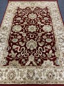 FFRITH LTD ZIEGLER PALACE RUG, red and cream bordered ground with repeating central pattern, 100%