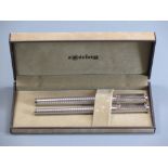 ROTRING FOUNTAIN PEN & BALLPOINT SET - 1980s, chased 925 sterling silver with 14ct white gold nib,