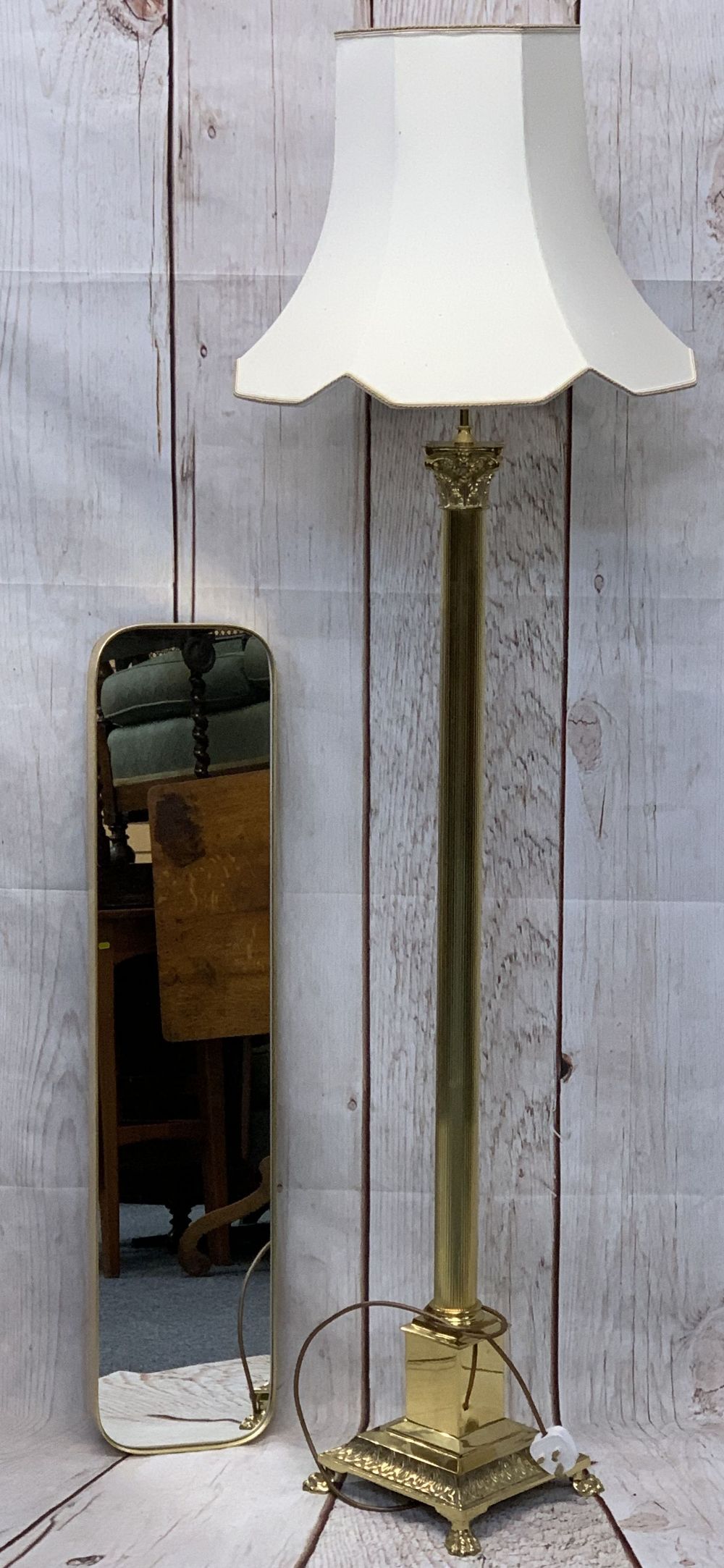 ANTIQUE STYLE CORINTHIAN CAP BRASS STANDARD LAMP WITH SHADE and a gilt framed modern wall mirror,