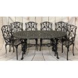 CAST METAL GARDEN TABLE & SIX ARMCHAIRS SET, openwork leaf design, the table being on four shaped