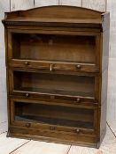 LEBUS VINTAGE OAK SECTIONAL BOOKCASE, three part with crown cap and base section, locking with