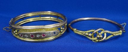 VICTORIAN NINE CARAT GOLD BANGLE set with semi-precious stones and another unmarked example in a