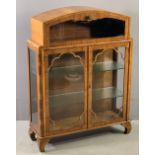 ART DECO STYLE DISPLAY CABINET with domed top, drop down upper section over two glazed doors, 119cms