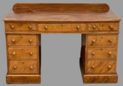 ANTIQUE SATINWOOD KNEEHOLE DESK with twin pedestal and railback to the top, 83cms H, 126cms W, 57cms