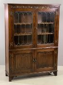 PRIORY OAK STYLE BOOKCASE CUPBOARD - linenfold lower doors with two upper leaded glass doors, with