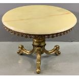 ONYX CIRCULAR TOPPED COFFEE TABLE on a brass pedestal support, 47 x 70cms