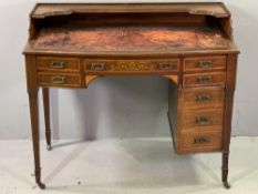 CROSSBANDED & INLAID MAHOGANY REGENCY STYLE KNEEHOLE DESK with leather tooled top, upper shelf, five