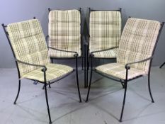 GARDEN FURNITURE - set of four black painted metal elbow chairs with 'Neptune Classics' seat and