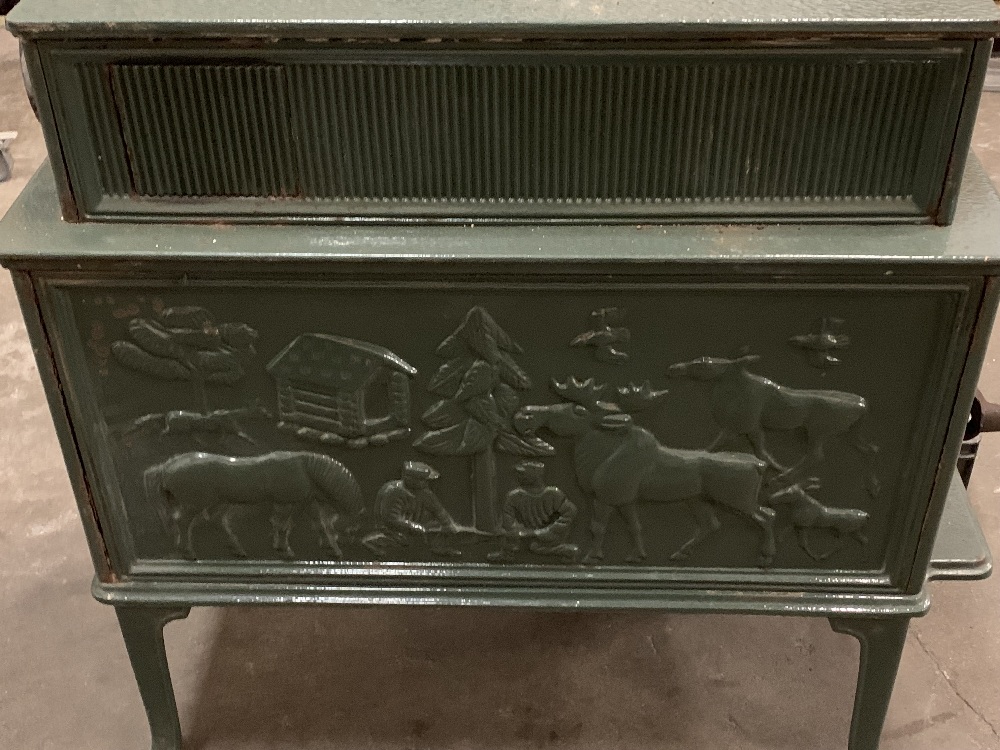 JOTUL GREEN ENAMELLED CAST IRON STOVE with people, moose and other animal detail in relief - Image 4 of 6
