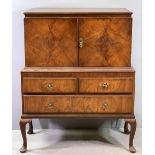 WALNUT EFFECT TALLBOY with two upper cupboard doors over two short and one long drawer, 128cms H,