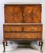 WALNUT EFFECT TALLBOY with two upper cupboard doors over two short and one long drawer, 128cms H,