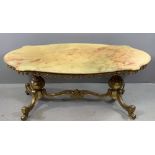 ONYX TOPPED OVAL COFFEE TABLE on twin pedestal brass supports, 48cms H, 121cms W, 57cms D