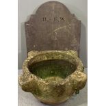 MORTAR SHAPE STONE PLANTER and a shaped top slab of slate, 26cms H, 53cms across and