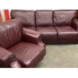 LEATHER EFFECT SOFA, three seater, burgundy, 90cms H, 230cms W, 99cms D and a matching armchair,