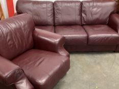 LEATHER EFFECT SOFA, three seater, burgundy, 90cms H, 230cms W, 99cms D and a matching armchair,
