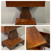 REGENCY MAHOGANY FOLDOVER TEA TABLE with interior storage compartment, on a shaped column and a