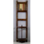 CIRCA 1930s OAK MIRRORED HALLSTAND, narrow with twist columns, drip tray and mirrored top, 183cms H,