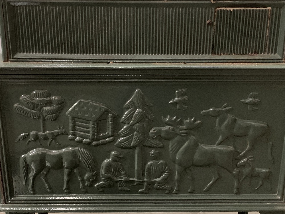 JOTUL GREEN ENAMELLED CAST IRON STOVE with people, moose and other animal detail in relief - Image 6 of 6