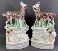 STAFFORDSHIRE FLATBACKS, a pair, standing goats with man and lady, 32cms H