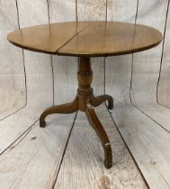 OAK TILT TOP TABLE - antique on tripod support, 72cms tall, 84cms diameter