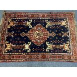 PERSIAN HAND WOVEN RUG - blue and red ground with central medallion and twin horses on columns
