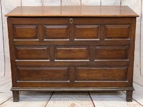 ANTIQUE OAK LIDDED COFFER - peg joined construction having a moulded edge top and multi-chamfered