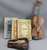 CASED MINIATURE CELLO & BOW, 19in violin and three music sheet books, the cello case bears label