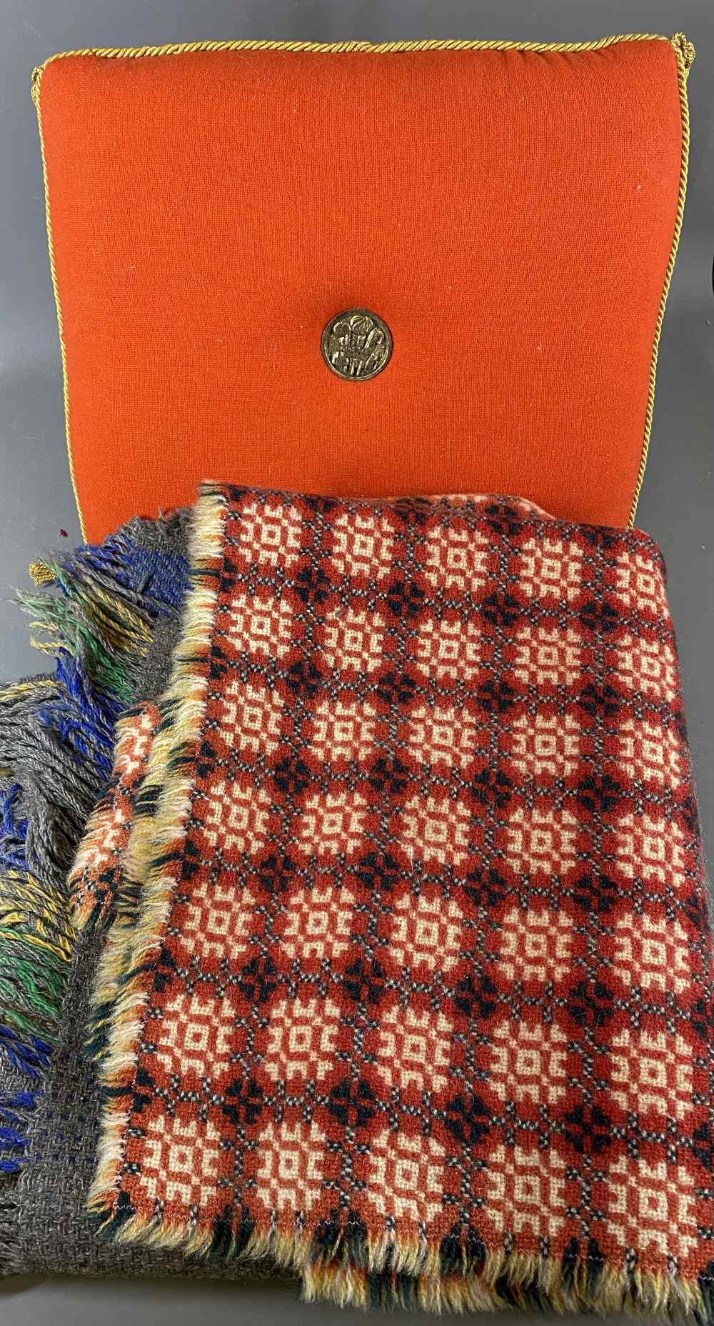HRH PRINCE CHARLES INVESTITURE CUSHION and two, possibly Welsh, woolwork throws