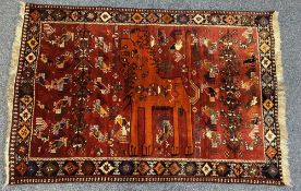 PERSIAN QASHQAI GABI HAND WOVEN IRANIAN RUG - red ground having a central pattern of a standing lion