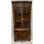 ELEGANT BOW FRONT CORNER DISPLAY CABINET - reproduction mahogany with twin underglaze doors, central