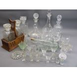 MOULDED GLASS & OTHER SPIRIT DECANTERS WITH STOPPERS along with drinks and other glassware to