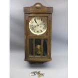 OAK CASED PENDULUM WALL CLOCK with a number of vintage clock keys, 63cms H