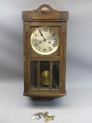 OAK CASED PENDULUM WALL CLOCK with a number of vintage clock keys, 63cms H