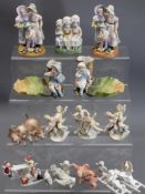 ORNAMENTAL CABINET FIGURINES - a mixed group including porcelain cherubic figurines, vintage snow
