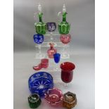 COLOURFUL GLASSWARE GROUP to include two green glass Victorian decanters with stoppers and enamel