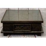 MEXICAN STYLE CARVED COFFEE TABLE - glass topped with drawer to each side on block supports, 32cms