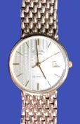 ROTARY QUARTZ 9CT GOLD WRISTWATCH WITH INTEGRAL BRACELET - gold tone dial set with baton markers,