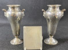 MASK HANDLED SILVER VASES, A PAIR and an engine turned cigarette case, Birmingham 1909,
