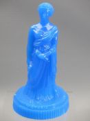 JOHN DERBYSHIRE BLUE PRESSED GLASS FIGURINE OF QUEEN VICTORIA - 21cms H