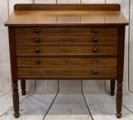 REGENCY STYLE MAHOGANY BEDROOM CHEST - of three drawers, having turned wooden knobs on carved reeded